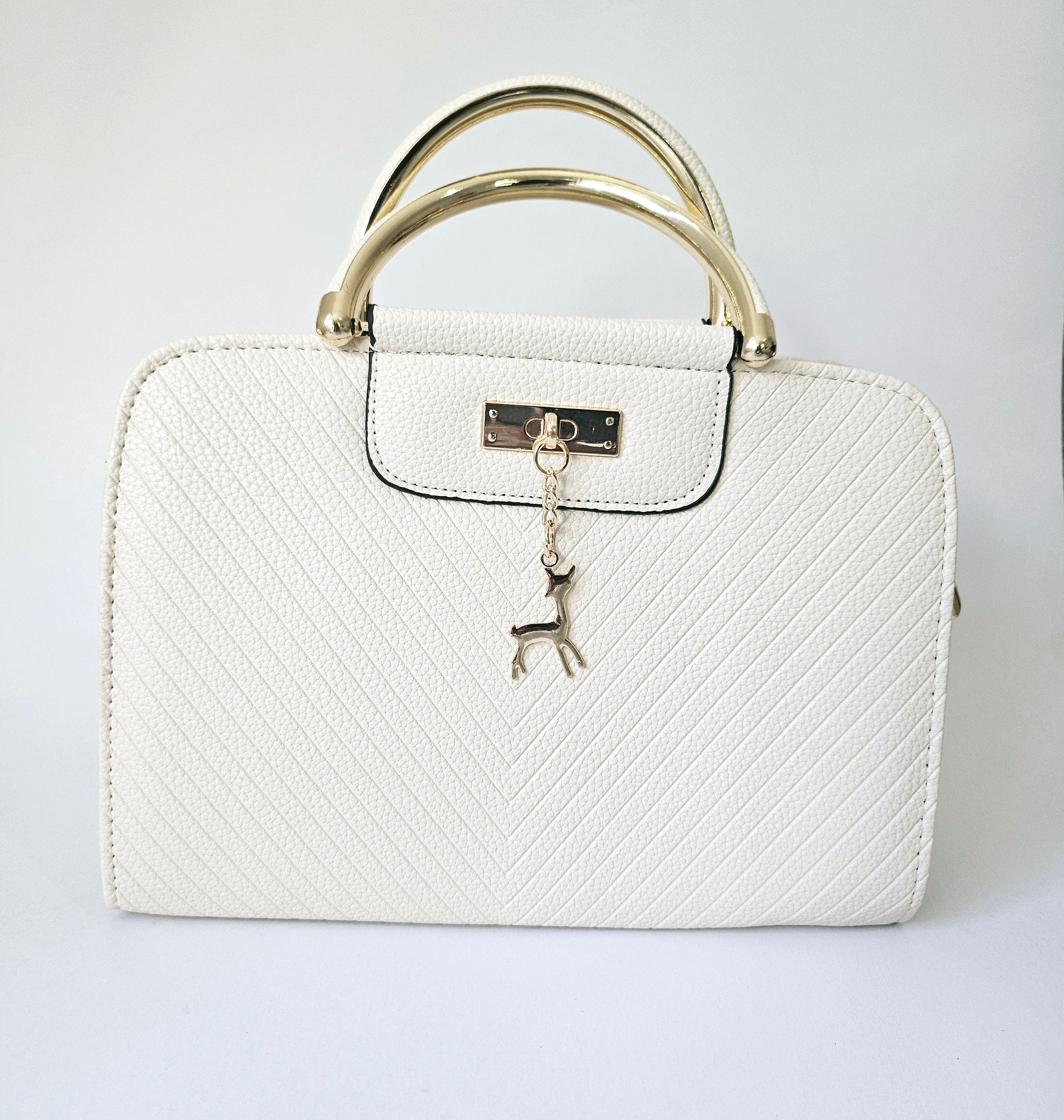 White Handbag with Deer Pendant and Golden Handles
