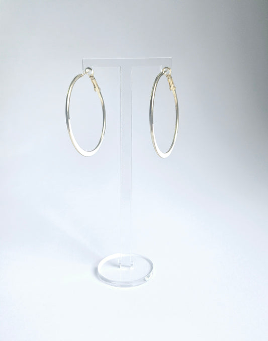 White and gold hoop earring